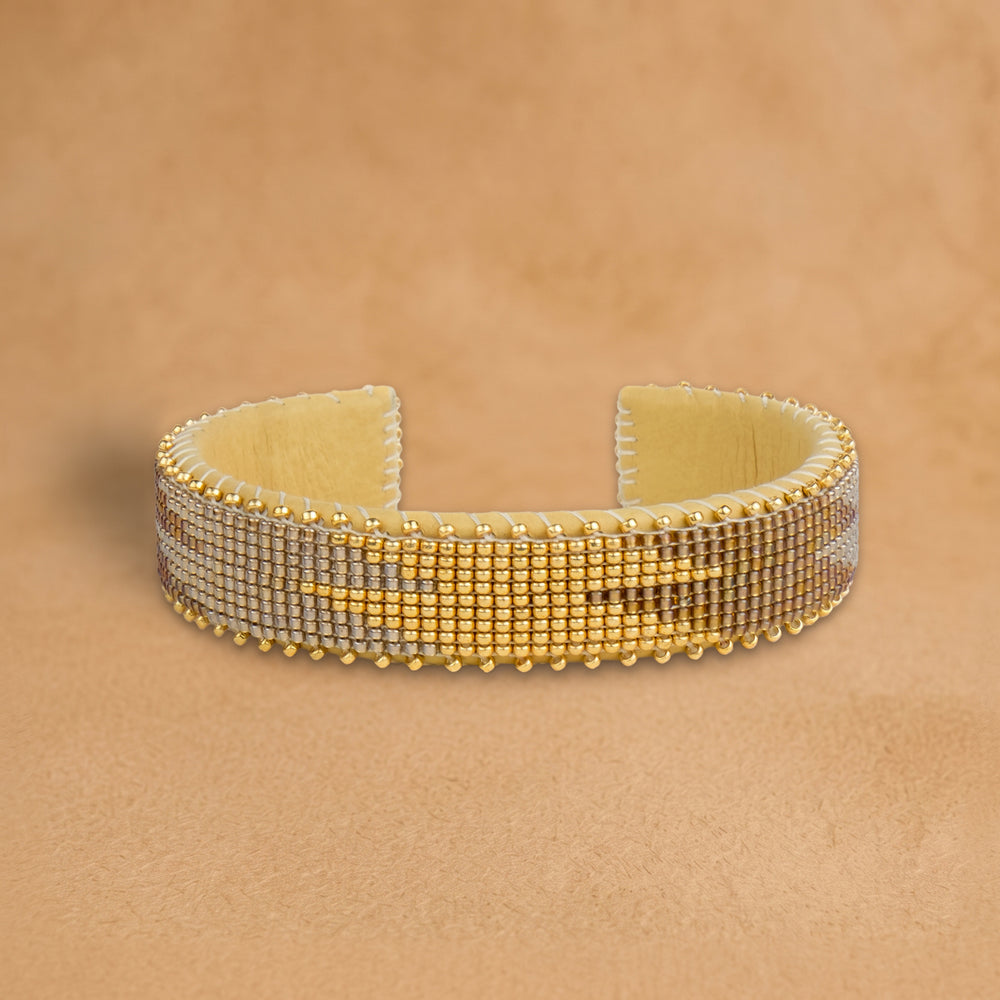 Aasha Small beaded cuff, bronze, silver and gold beads in a flame pattern, handloomed by Navajo artisans in New Mexico