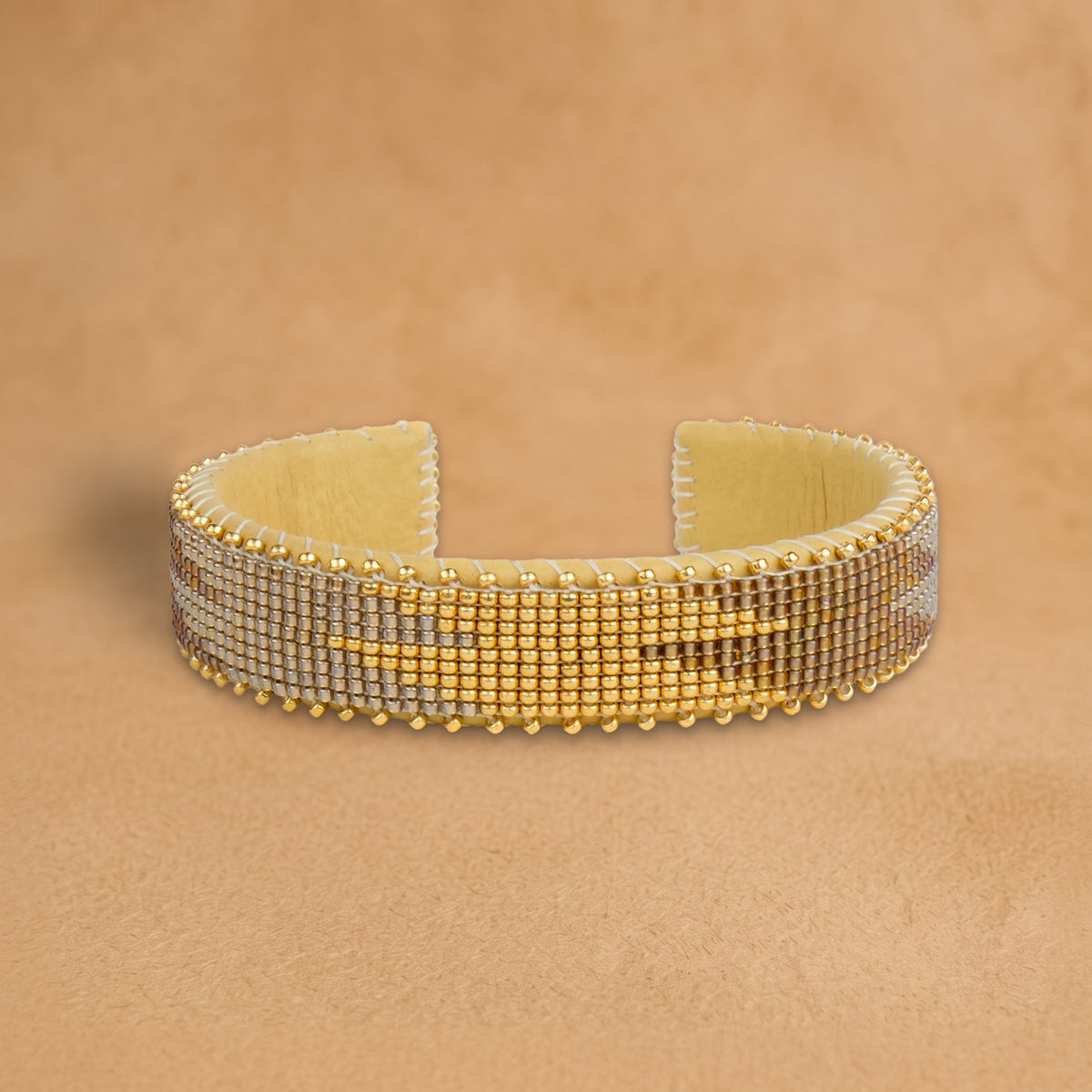 Aasha Small beaded cuff, bronze, silver and gold beads in a flame pattern, handloomed by Navajo artisans in New Mexico