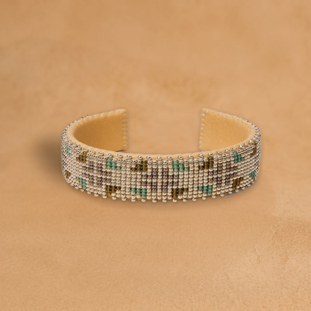 Aurora Medium beaded cuff, silver beads with mint green and olive triangles, handloomed by Navajo artisans in New Mexico
