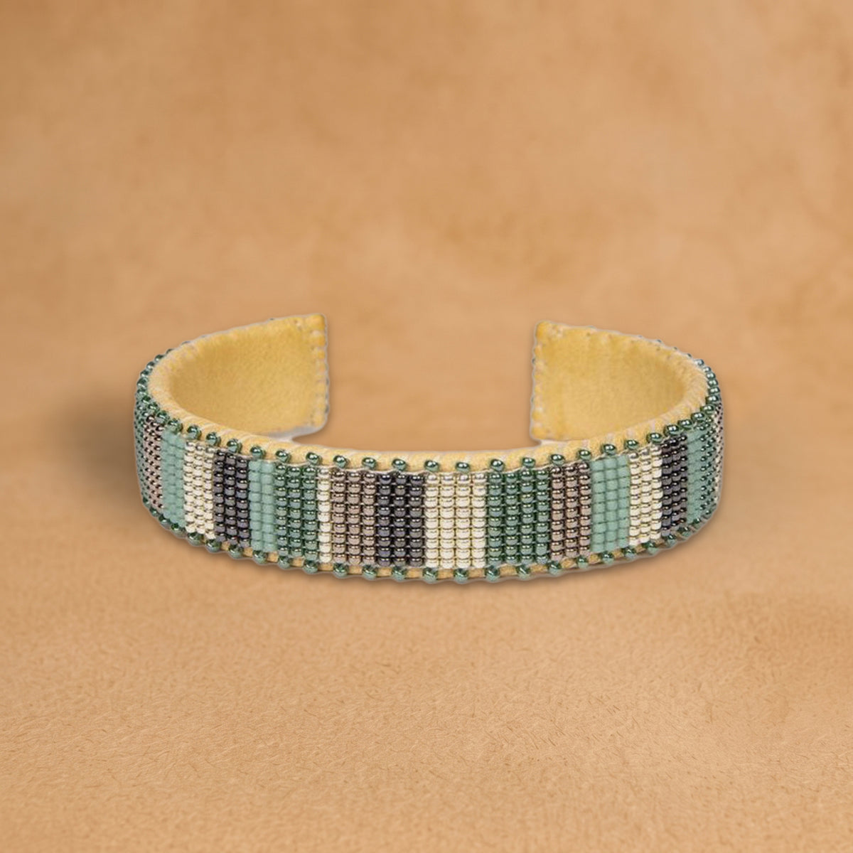 Avani Small beaded cuff, vertical stripes in sage green, grey, cream and charcoal, handloomed by Navajo artisans in New Mexico