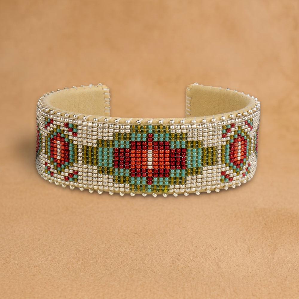 Becca Large beaded cuff, white beads with a red, turquoise and olive green medallion and red diamonds, handloomed by Navajo artisans in New Mexico
