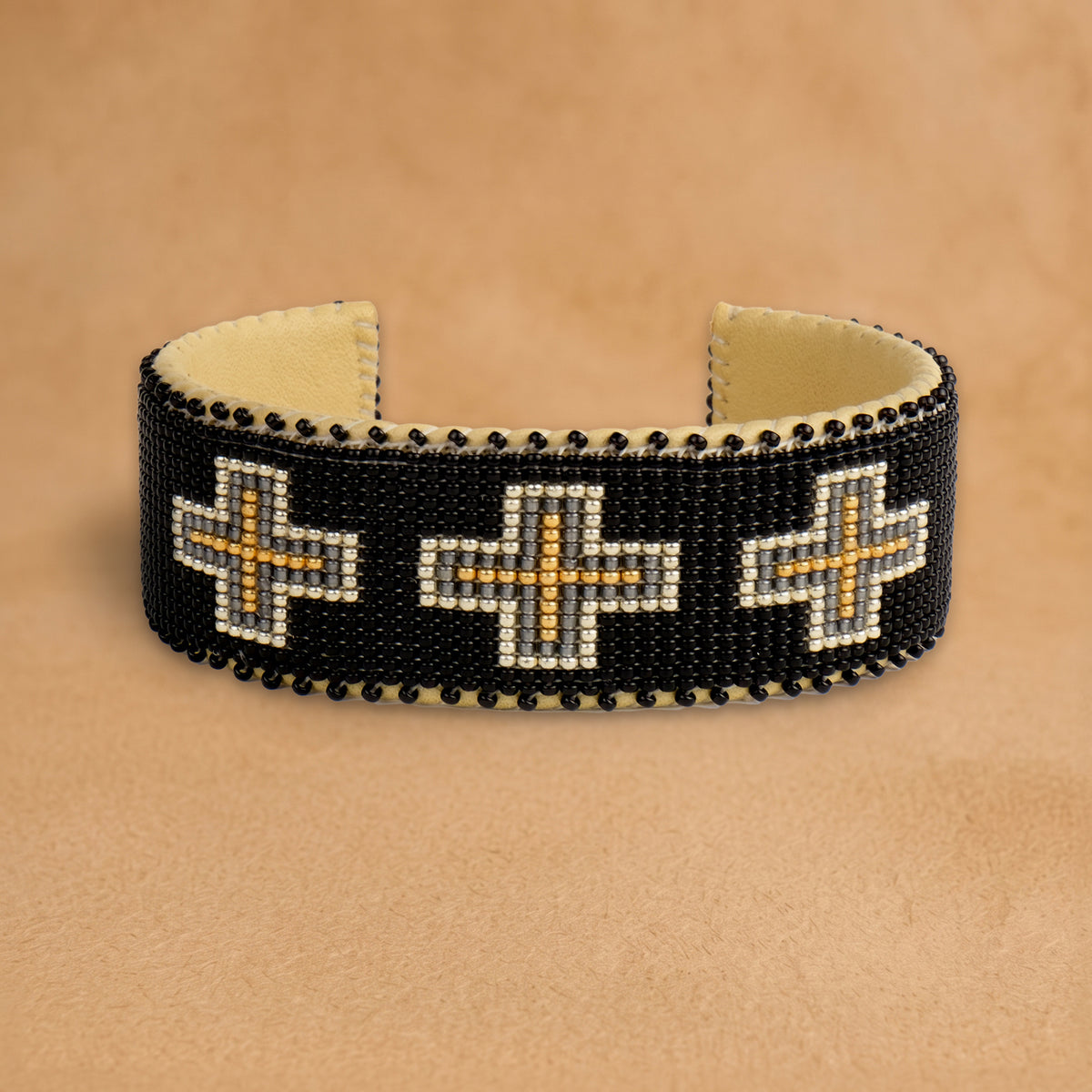 Cara Large beaded cuff, black with cream, grey and gold crosses, handloomed by Navajo artisans in New Mexico