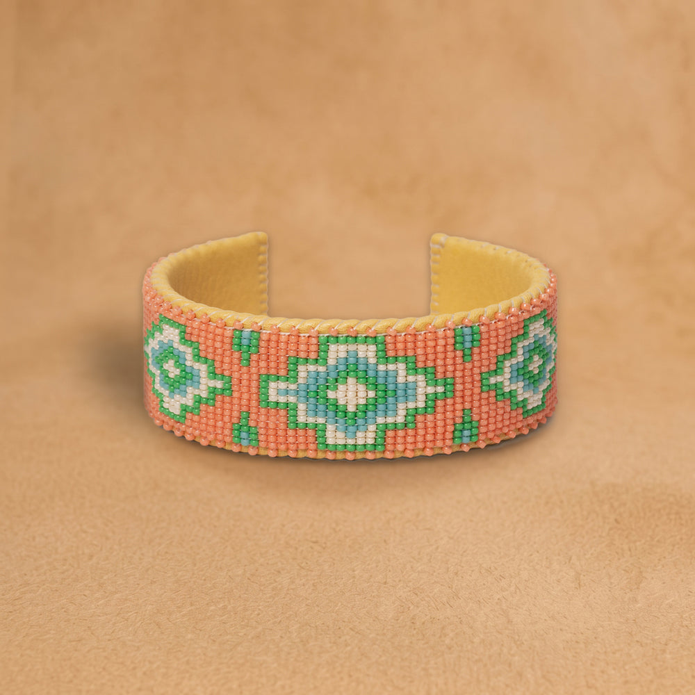 Cora Large beaded cuff, coral with turquoise, green and white stepped diamonds, handloomed by Navajo artisans in New Mexico