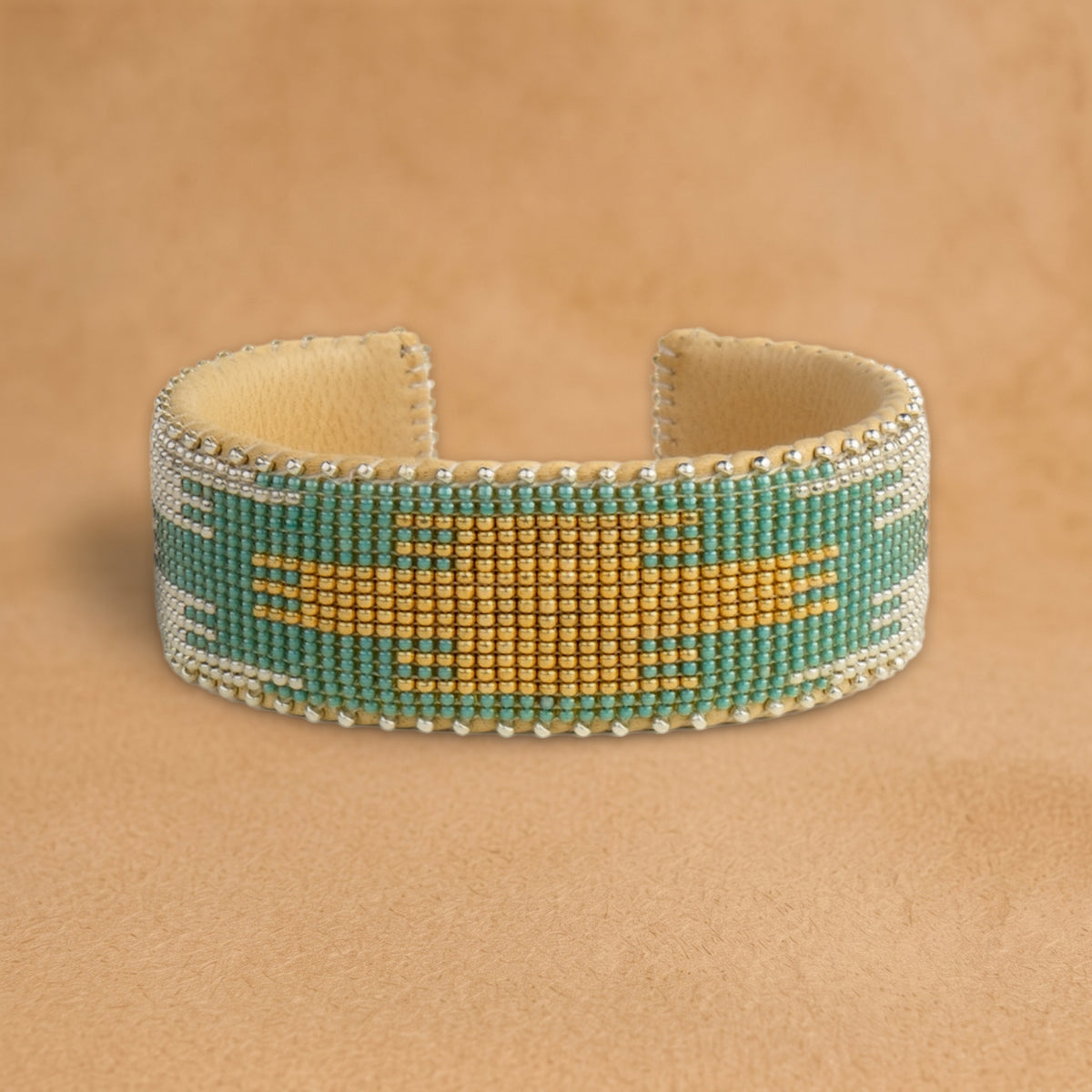 Fiona Large beaded cuff, turquoise with a gold and silver flame center, handloomed by Navajo artisans in New Mexico