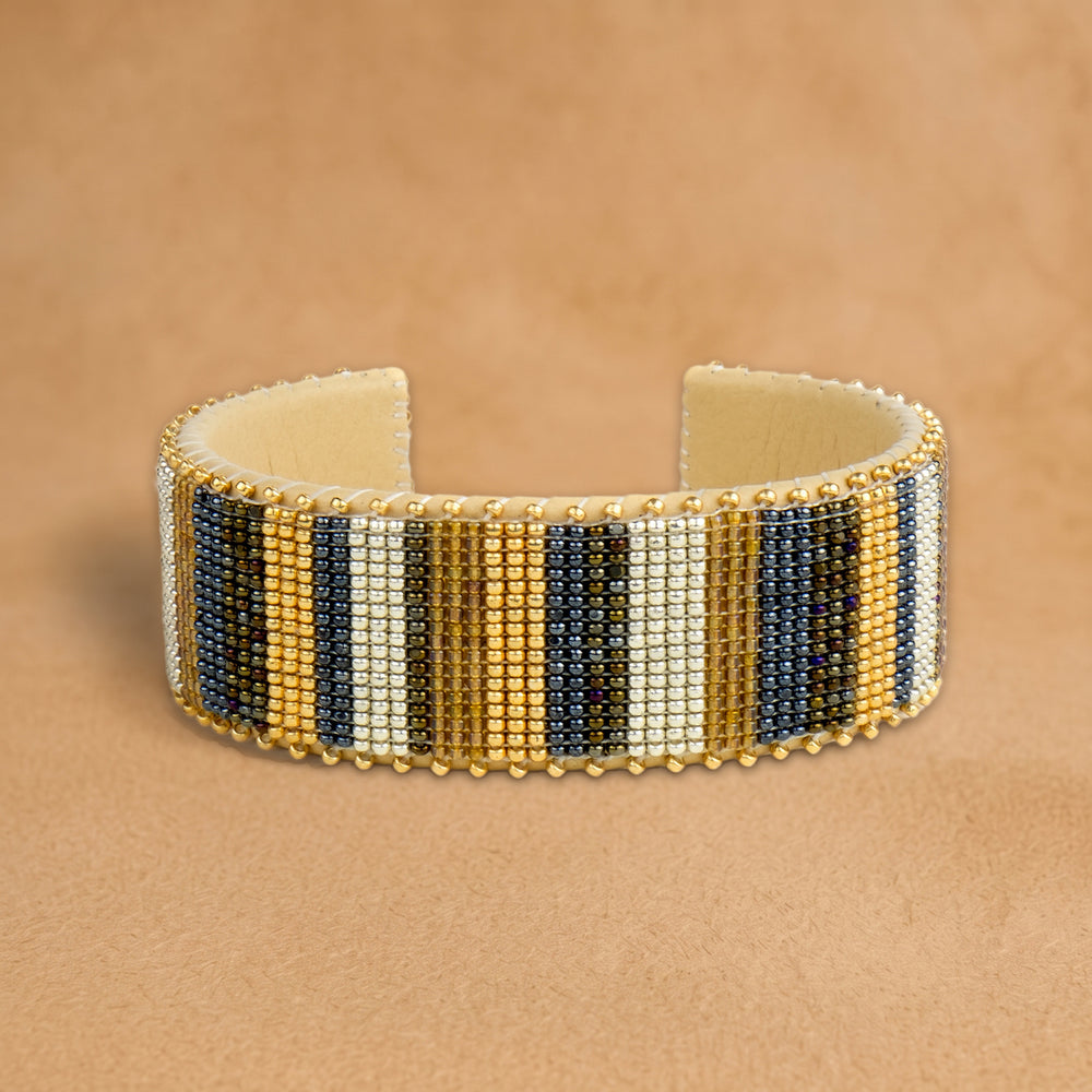 Jordan Large beaded cuff, vertical stripes in gold, navy, cream and black, handloomed by Navajo artisans in New Mexico