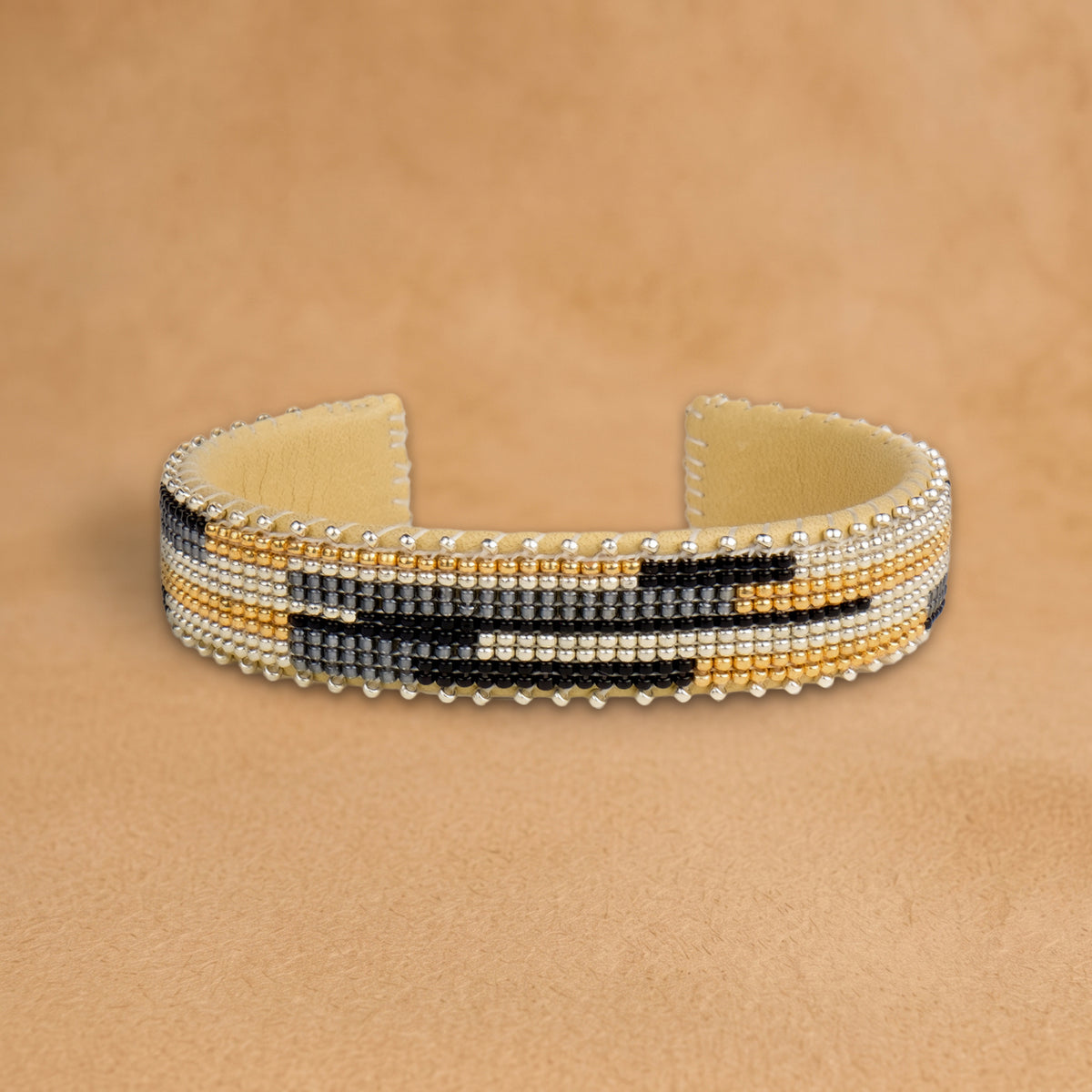 Kalani Small beaded cuff, cream, gold, black and grey offset bars, handloomed by Navajo artisans in New Mexico