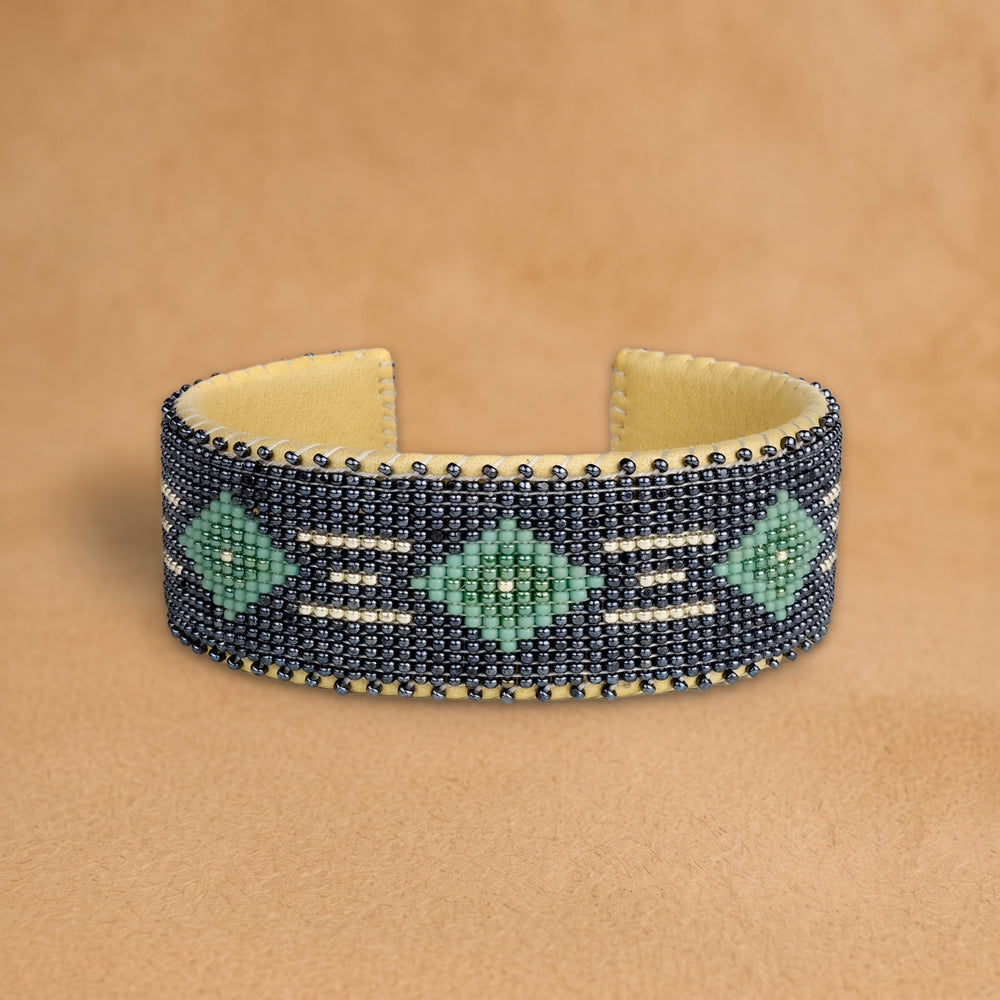 Kelly Green Large beaded cuff, navy with seafoam green diamonds and white dashes, handloomed by Navajo artisans in New Mexico