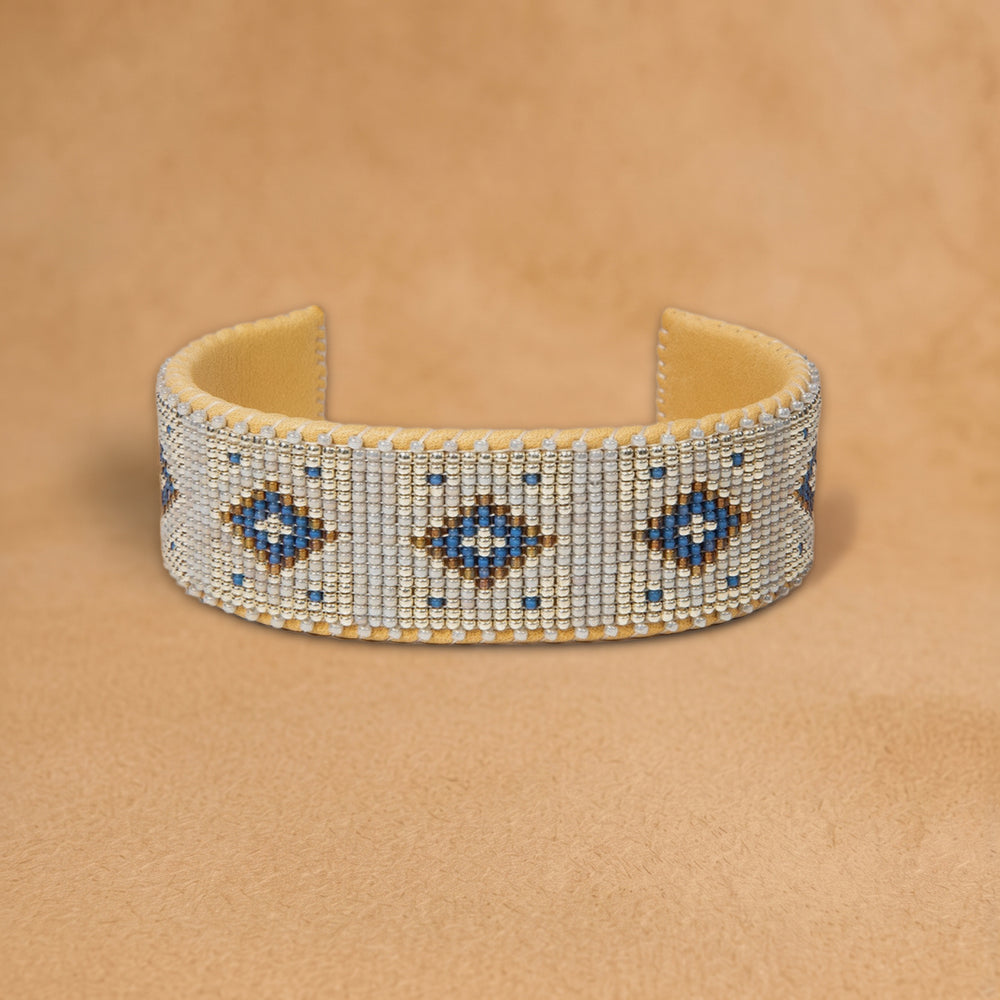 Lina Large beaded cuff, silver with cobalt blue diamonds outlined in gold, handloomed by Navajo artisans in New Mexico