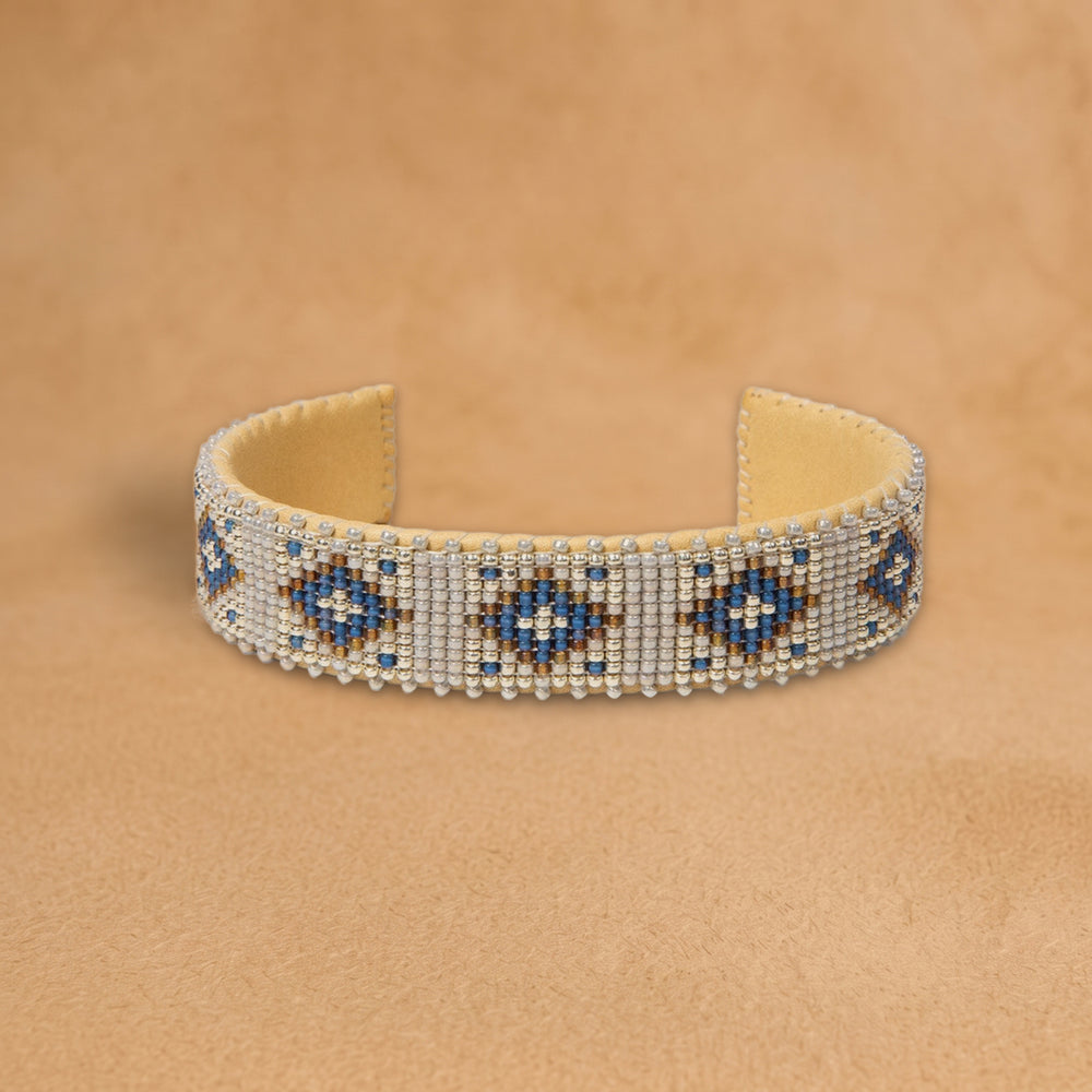 Lina Medium beaded cuff, silver with cobalt blue diamonds outlined in gold, handloomed by Navajo artisans in New Mexico