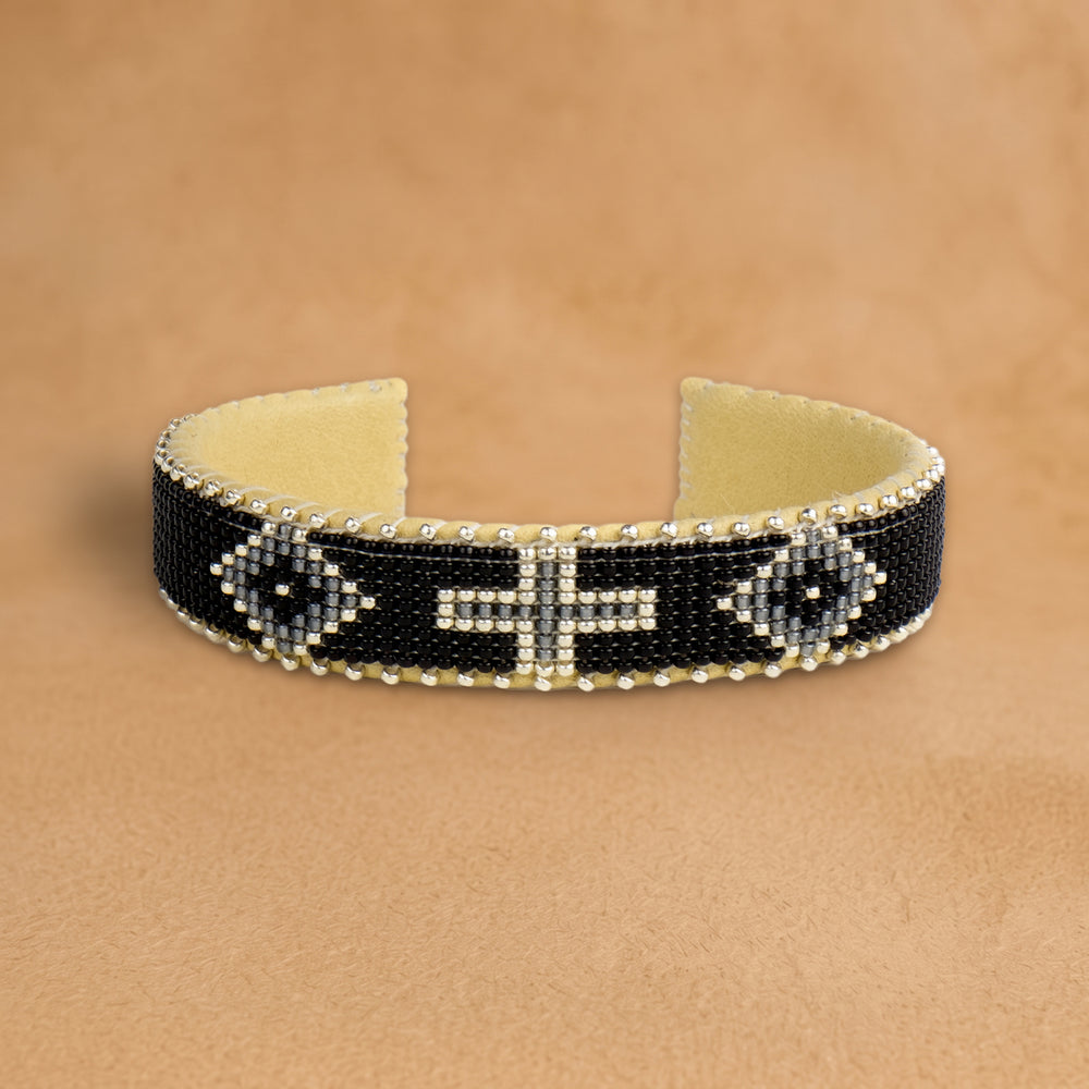Lolita Small beaded cuff, black with grey diamonds and a silver cross, handloomed by Navajo artisans in New Mexico