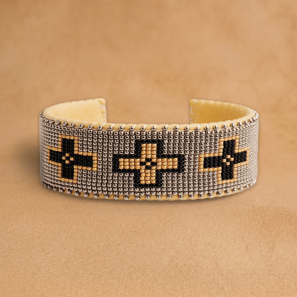 Maize Large 7 inch beaded cuff, silver-grey with black and peach crosses, handloomed by Navajo artisans in New Mexico