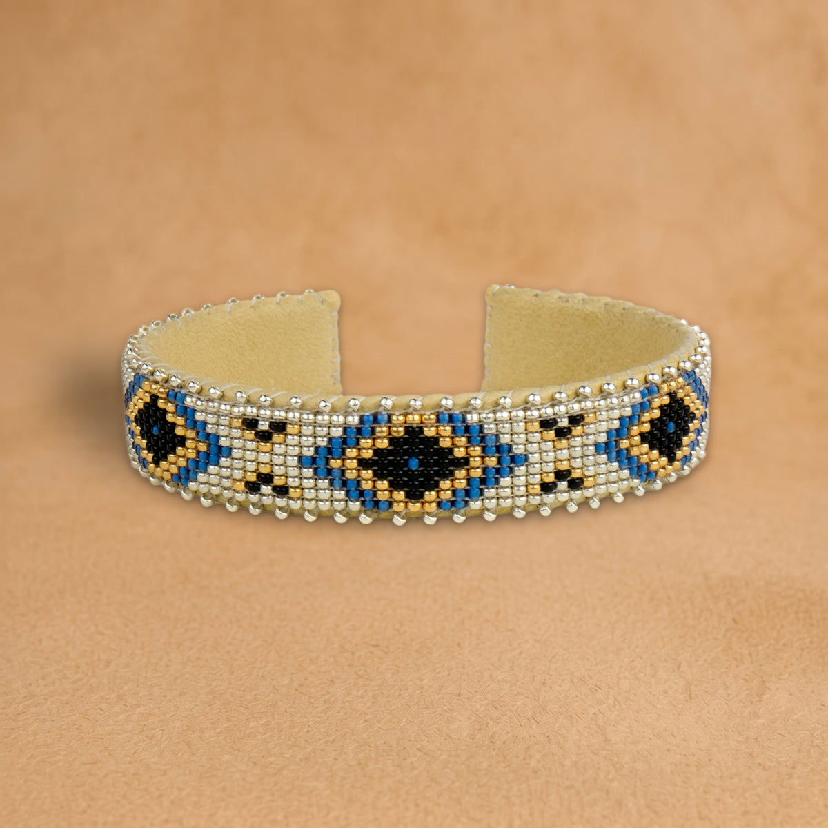 Nova Small beaded cuff, white with black, cobalt blue and gold diamonds, handloomed by Navajo artisans in New Mexico