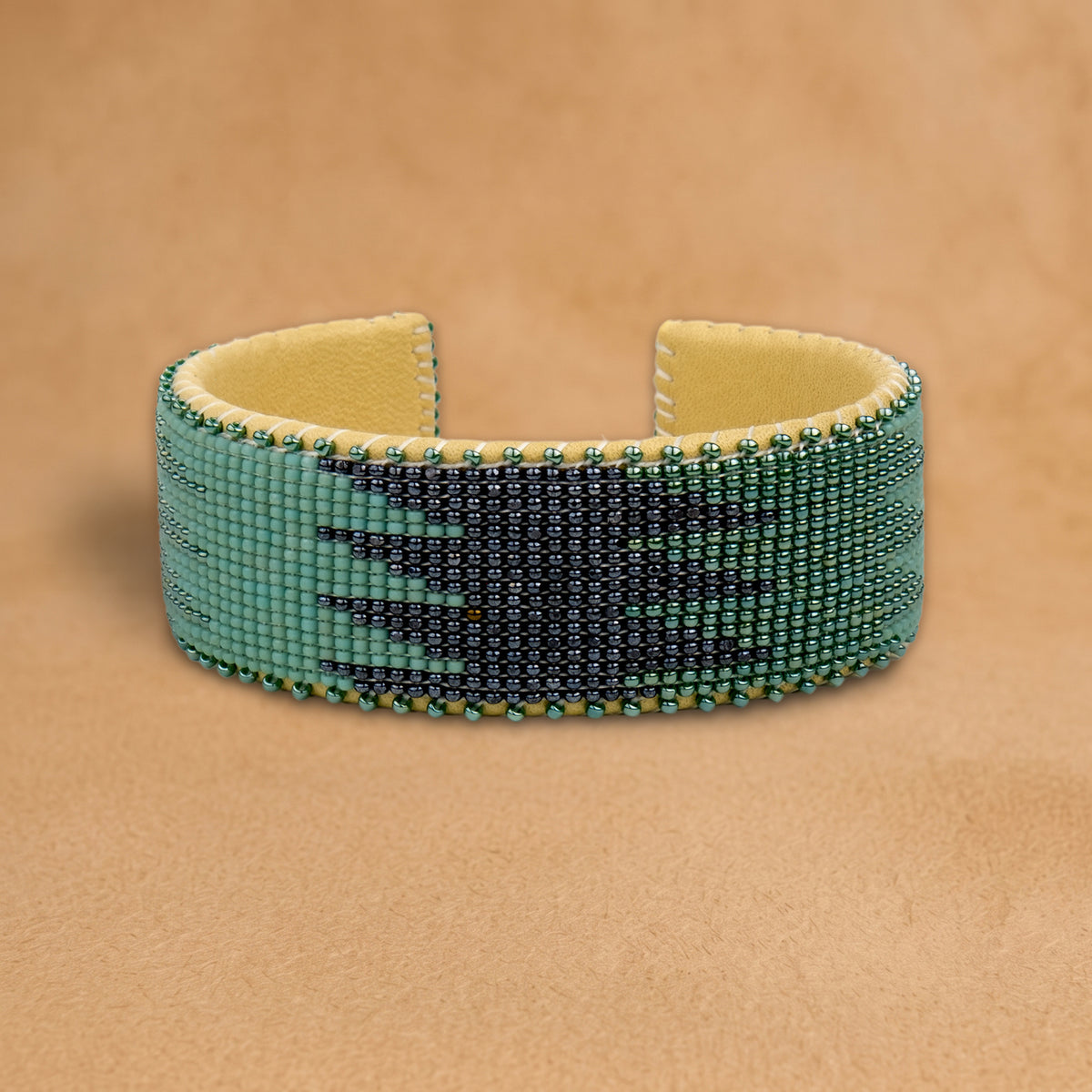 Ocean Large beaded cuff, teal green and navy flame pattern, handloomed by Navajo artisans in New Mexico