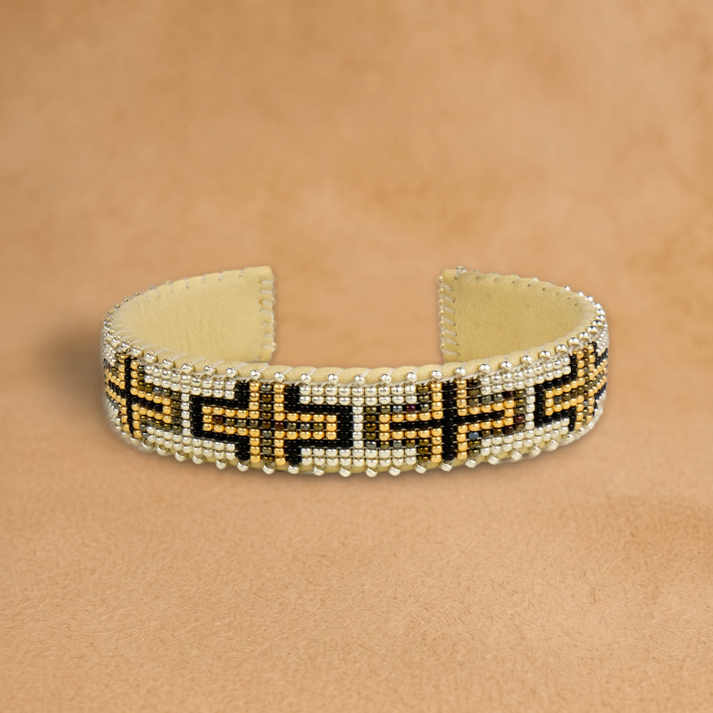 Owen Small beaded cuff, white with black and gold crosses, handloomed by Navajo artisans in New Mexico