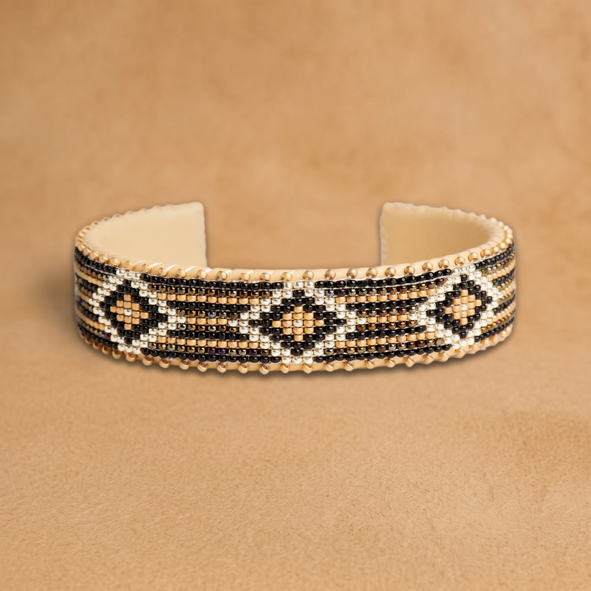 Pilar Medium beaded cuff, black, peach and white stripes with diamonds, handloomed by Navajo artisans in New Mexico