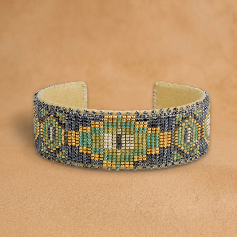 Tai Large beaded cuff, slate grey with a gold, sage and mint medallion, handloomed by Navajo artisans in New Mexico