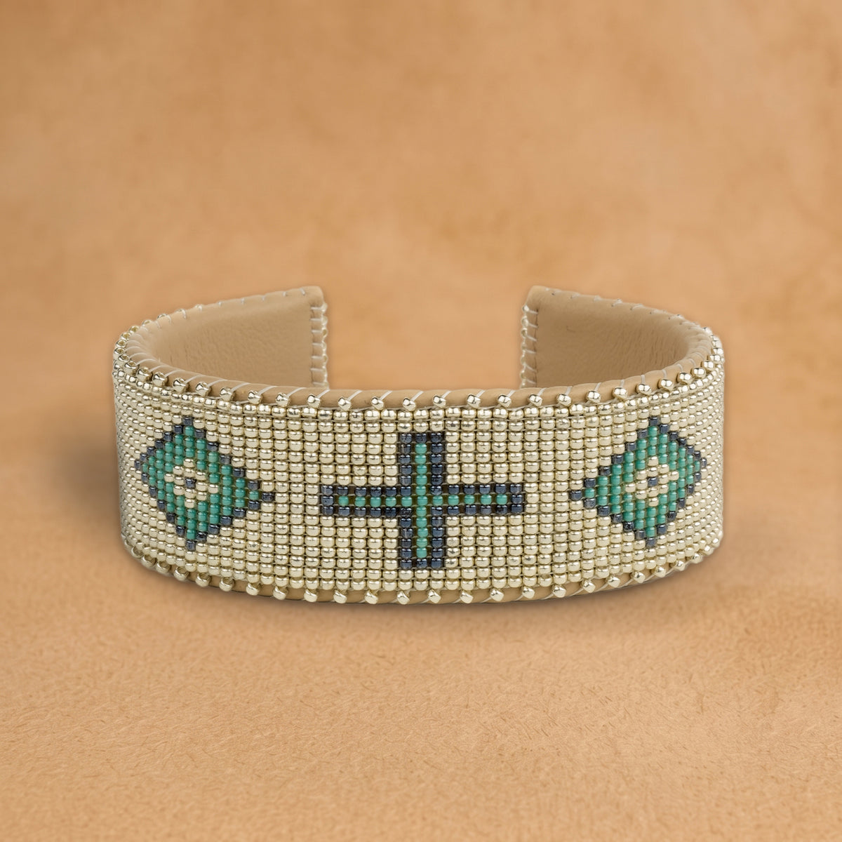 Theo Large beaded cuff, silver with turquoise and navy crosses and diamonds, handloomed by Navajo artisans in New Mexico