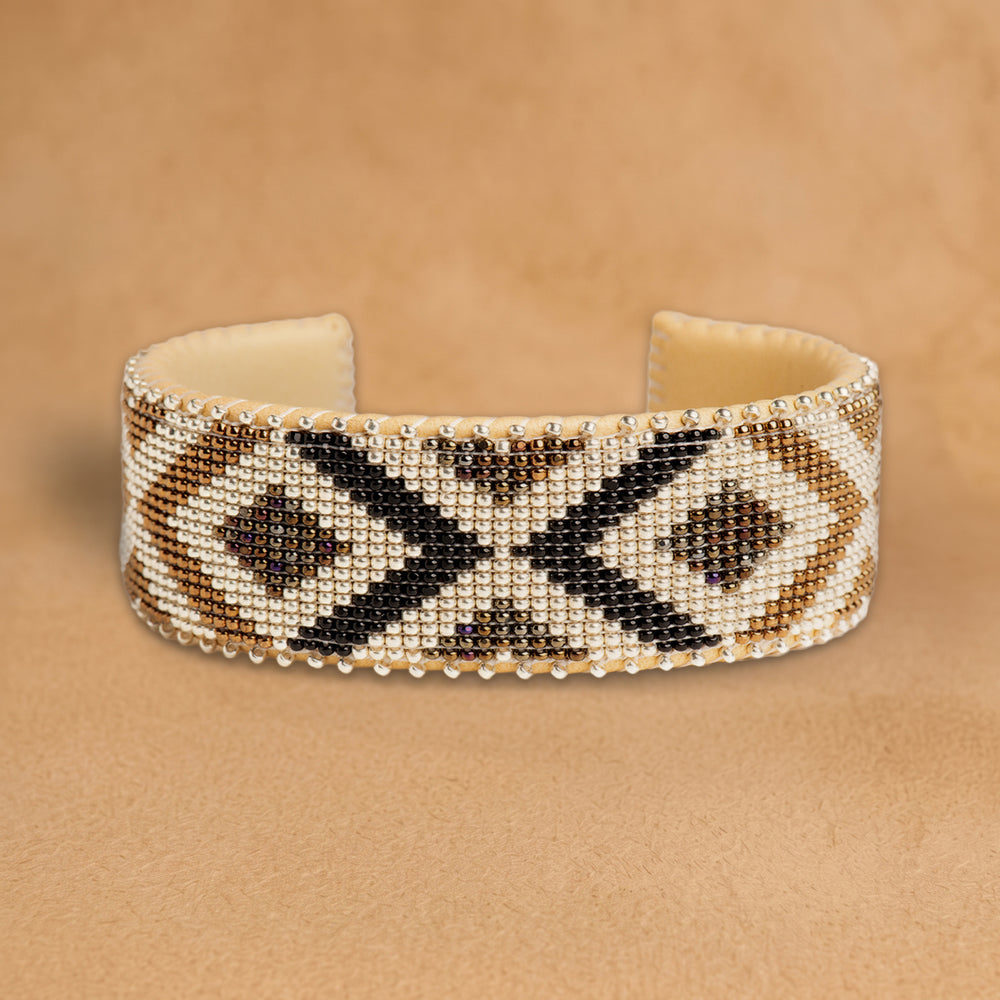 Winter Large beaded cuff, white with black and bronze chevrons and diamonds, handloomed by Navajo artisans in New Mexico