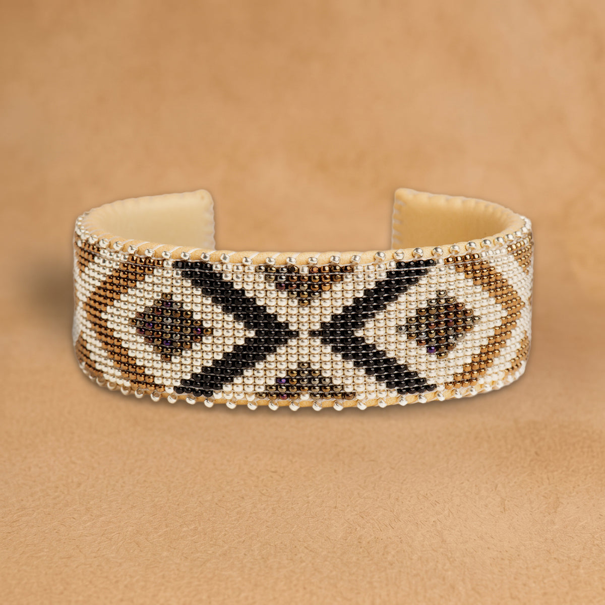 Winter Large beaded cuff, white with black and bronze chevrons and diamonds, handloomed by Navajo artisans in New Mexico
