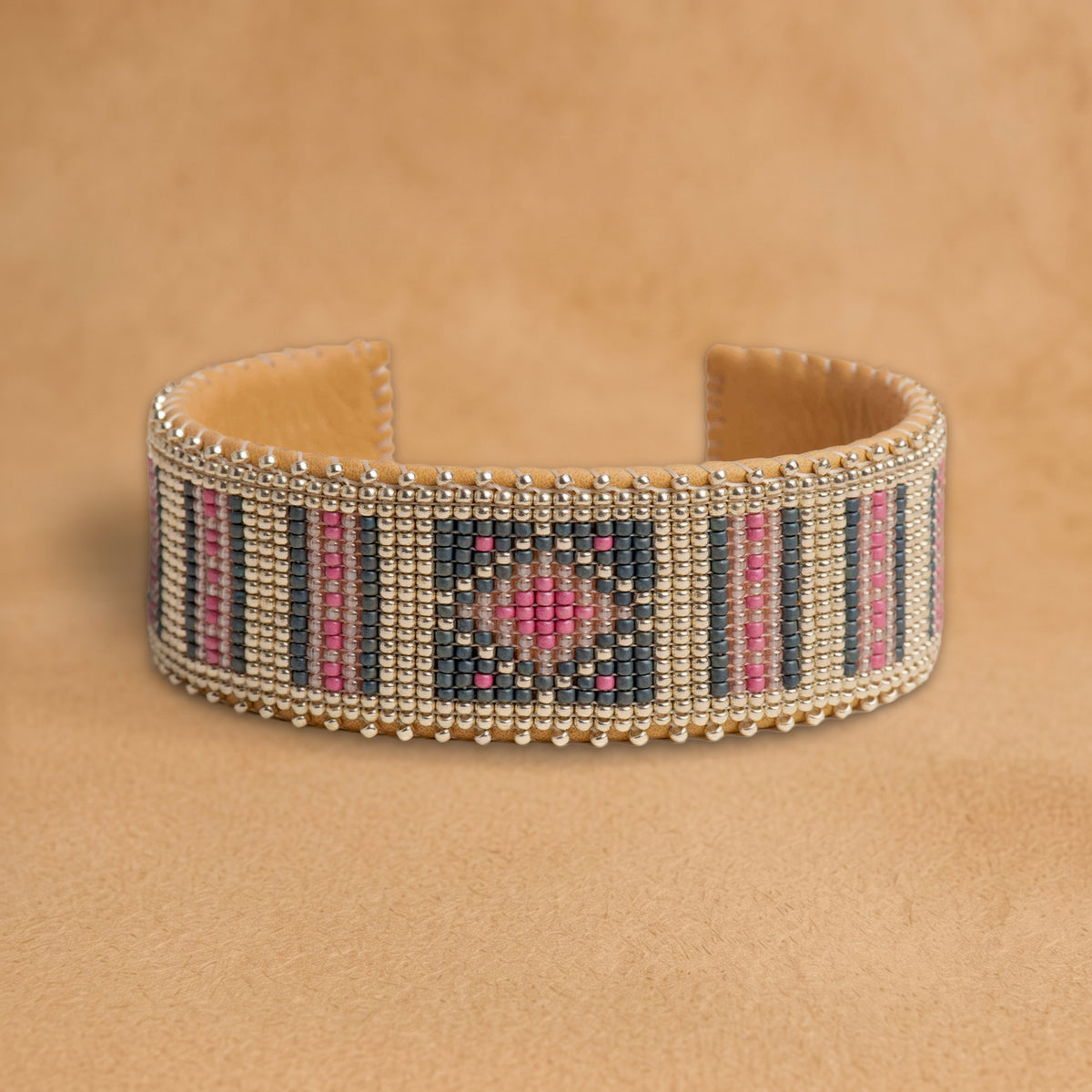 Zuri Large beaded cuff, silver with charcoal and pink stripes and a center diamond, handloomed by Navajo artisans in New Mexico